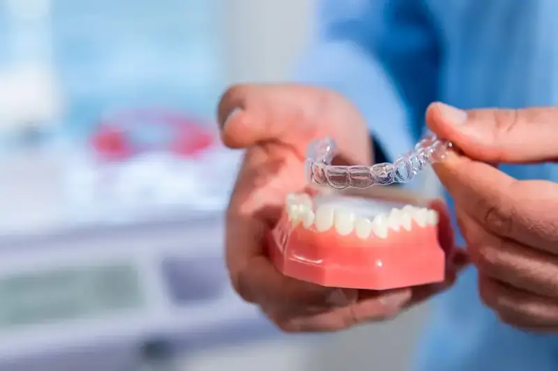 Zakończenie leczenia nakładkami Invisalign